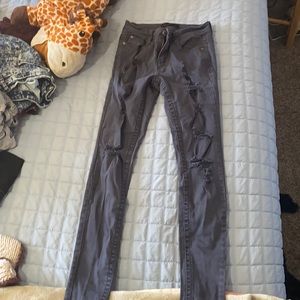 Light washed ripped grey jeans worn only twice